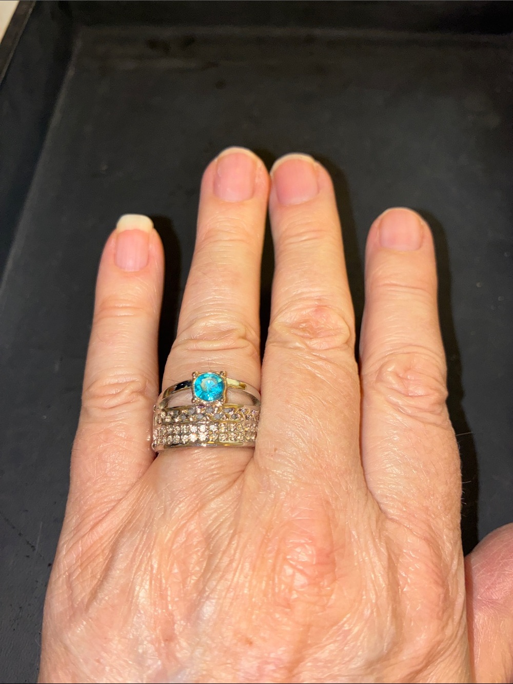 Silver-Tone has Blue Gem and Cubic Zirconia Stretch Stacking Ring Set Connected
